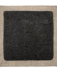 Deep black linseed oil paint sample on square of linen. Solvent-free paint. Better paint for the planet.