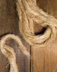 Oakum strands used for weatherproofing cracks in wood.