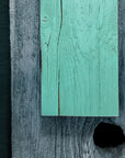 Preserving Americas homes in an environmentally friendly way. Light green on rough sawn wood.