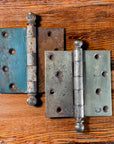 Metal door hinge before and after paint removal from soaking in hot linseed oil soap solution.