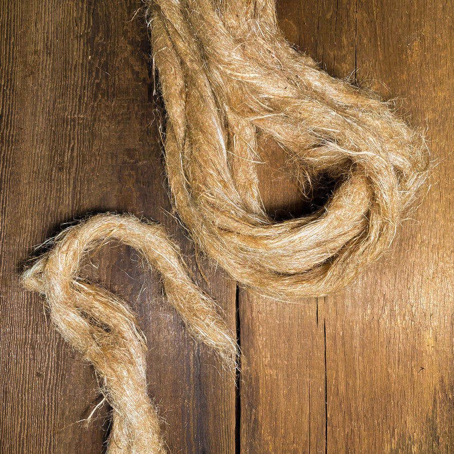 Oakum strands used for weatherproofing cracks in wood. 