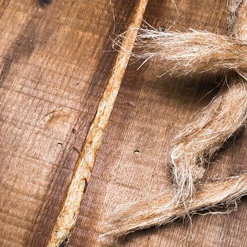 Nupak dry Oakum packed into crack in wooden timber