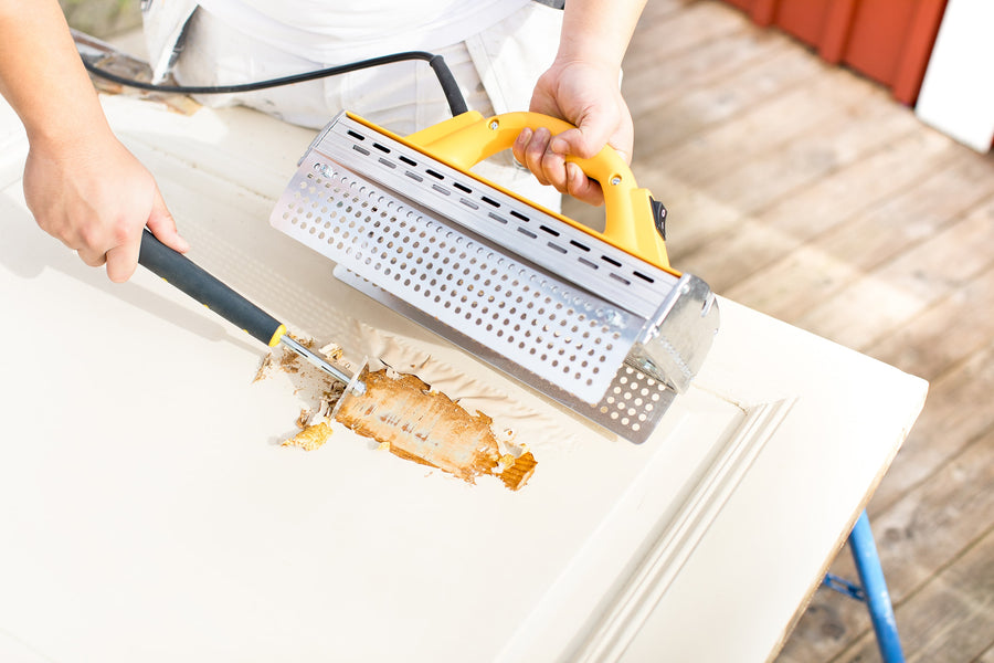 Speedheater standard being used to remove paint from a door.