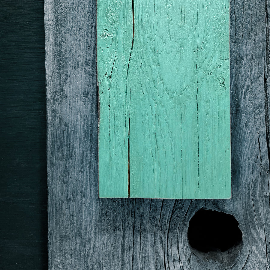 Preserving Americas homes in an environmentally friendly way. Light green on rough sawn wood.