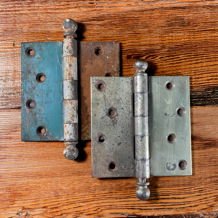 Metal door hinge before and after paint removal from soaking in hot linseed oil soap solution. 