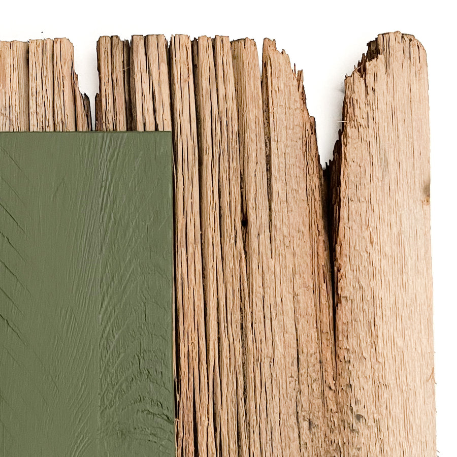 Traditional house paint in green. Linseed oil paint prevents rot in historic houses.